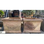 A pair of buff terracotta square Planters with swa