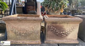 A pair of buff terracotta square Planters with swa
