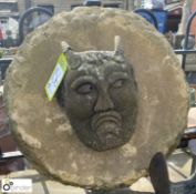 A carved Yorkshire stone Grotesque Head mounted on a round Yorkshire stone plaque, approx. 24in (Lot