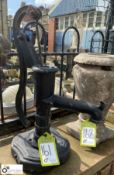A cast iron Victorian style Water Pump head on a r