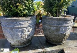 A pair of reconstituted stone Planters with fruit