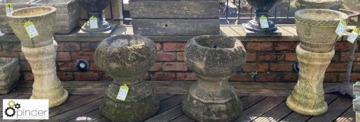 A pair of reconstituted stone Planters with hoop a