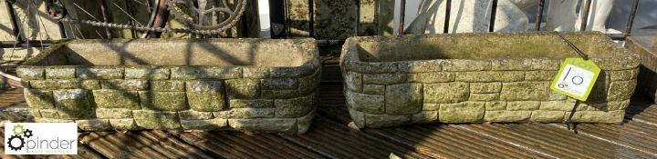 A pair of reconstituted stone Planters with faux s