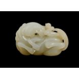 A CHINESE WHITE JADE CARVING OF A HORSE, 18TH CENTURY, QING DYNASTY (1644-1911)