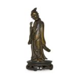 A CHINESE BRONZE FIGURE OF A MALE IMMORTAL, 16TH/17TH CENTURY