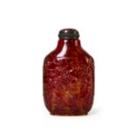 A CARVED CHINESE AMBER "DRAGON & PHOENIX" SNUFF BOTTLE, 19TH CENTURY, QING DYNASTY (1644-1911)