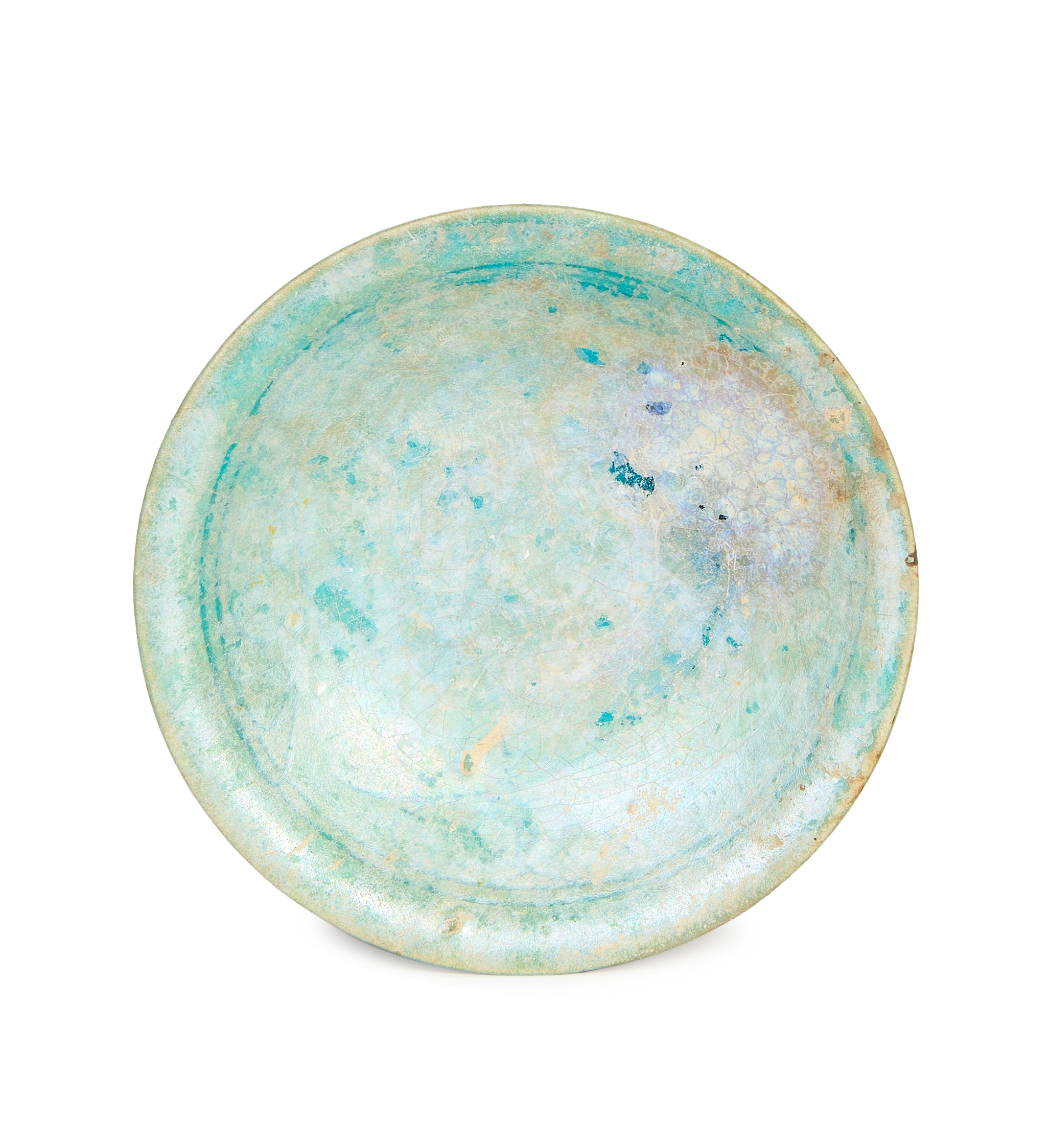 A KASHAN TURQUOISE GLAZED POTTERY FOOTED DISH, 12TH CENTURY IRAN