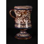 AN HISPANO-MORESQUE COPPER LUSTRE POTTERY FOOTED CUP, 17TH/18TH CENTURY OR LATER