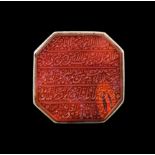 A CARVED ISLAMIC CARNELIAN CALLIGRAPHIC SEAL RING, SET ON SILVER 19TH CENTURY