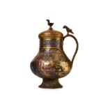 A KHORASSAN SILVER INLAID COVERED BRONZE JUG NORTH EAST IRAN, 12TH CENTURY