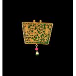 AN INDIAN ENGRAVED GOLD FOILED GREEN ENAMEL PENDANT, 19TH CENTURY