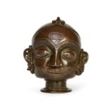 A BRONZE HEAD OF GAURI, WESTERN INDIA, PROBABLY MAHARASHTRA, 19TH CENTURY OR LATER