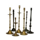 SEVEN OTTOMAN BRASS CANDLESTICKS, 19TH CENTURY OR LATER