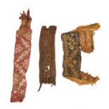 ASSORTMENT OF COPTIC & FATIMID SILK (TIRAZ) TEXTILE FRAGMENTS, CIRCA 5TH-10TH CENTURY