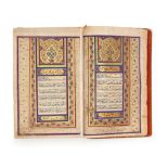 A LARGE ILLUMINATED QAJAR QURAN SIGNED ABD ALALI ALTABRIZY, DATED 1387AH. PERISA