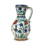 AN IZNIK POTTERY JUG OTTOMAN TURKEY, 17TH CENTURY