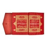 A RED PAPER, DONE IN THE COLOUR OF QATAR, COMMISSIONED TO SHEIKH HAMAD AL THANI, HAMMERED GOLD & SIL