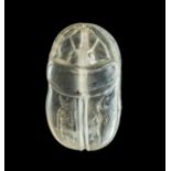 A HIGHLY RARE INSCRIBED EGYPTIAN ROCK CRYSTAL CARVED SCARAB OF HORUS & ORIRIS, PTOLEMAIC PERIOD,