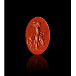 A ROMAN JASPER INTAGLIO OF A MAN & A HORSE, CIRCA 3RD CENTURY A.D.