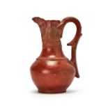 A RED TERACOTTA WATER JUG, NASRID SPAIN, 15TH CENTURY