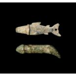 A SILVER FISH & BRONZE PHALLUS PENDANT, BYZANTINE, CIRCA 5TH CENTURY