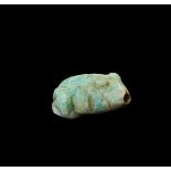 A PRE COLOUMBIAN TURQUOISE FROG BEAD