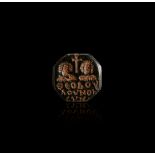 A BYZANTINE INTAGLIO WITH PORTAIRS OF A COUPLE AND A CROSS (WEDDING CEREMONY) CIRCA 5TH CENTURY A.D.