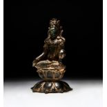 A HIGHLY IMPORTANT GANDHARA SILVER INLAID BRONZE SEATED BODHISATTVA , 7TH/8TH CENTURY