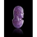 AN AMETHYST BUST OF A DEITY, LATE PERIOD TO PTOLEMAIC PERIOD, 664-30 B.C.