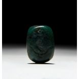A ROMAN THREE DIMENSIONAL CHALCYDOINY BEAD OF A DOLPHIN, BIRD & TWO HANDS, ARCHAIC PERIOD CIRCA 5TH