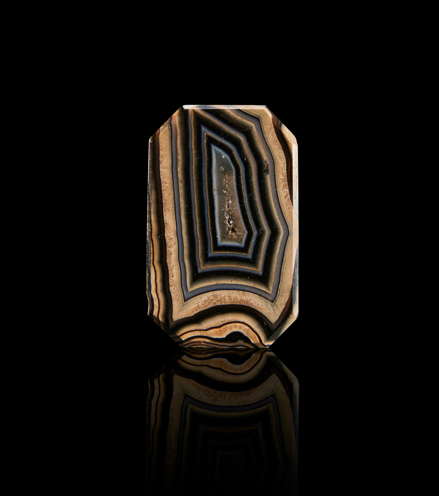 A BANDED AGATE BEAD IN RECTANGULAR FORM, PROBABLY ANCIENT