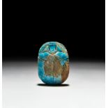 AN INSCRIBED EGYPTIAN TURQUOISE FAIENCE SCARAB PTOLEMAIC PERIOD (332-30 B.C.)