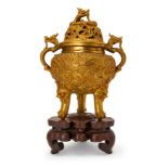 A LARGE CHINESE "DRAGON" GILT BRONZE TRIPOD CENSER, XUANDE MARK, QING DYNASTY (1644-1911)