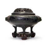 A CHINESE BRONZE TRIPOD CENSER, QING DYNASTY (1644-1911)