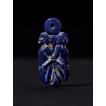 A HIGHLY RARE CONJOINED EGYPTIAN BLUE COOKED GLASS "LOVER" AMULET MIDDLE KINGDOM, DYNASTY XII-XIII,