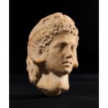 A GRAECO-EGYPTIAN MARBLE PORTRAIT HEAD OF ALEXANDER THE GREAT MID-3RD/MID-2ND CENTURY B.C.