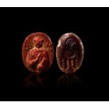 TWO COOKED GLASS BYZANTINE CAMEOS, CIRCA 7TH CENTURY A.D.