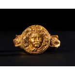 A ROMAN GOLD MEDUSA RING, CIRCA 1ST-2ND CENTURY A.D.