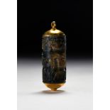 AN AKKADIAN GOLD MOUNTED JASPER CYLINDER SEAL LATE AKKADIAN, CIRCA 2254-2154 B.C.