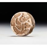AN INDUS VALLEY MOHENJO-DARO STAMP SEAL CIRCA 2600BC- 1900BC