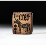 AN INDUS VALLEY MOHENJO-DARO STAMP SEAL CIRCA 2600BC- 1900BC