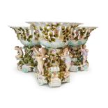 THREE ENCRUSTED CHERUB FLORAL CENTREPIECES, GERMAN