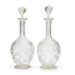A PAIR OF CUT CRYSTAL DECANTERS, 19TH CENTURY