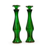 A PAIR OF GREEN GLASS SCENT BOTTLES WITH STOPPERS, 19TH/20TH CENTURY
