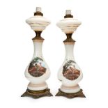 A PAIR OF HAND PAINTED FLORAL OPALINE OIL LAMPS, 19TH CENTURY