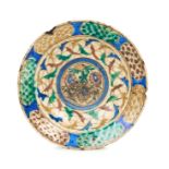 A KUBACHI POLYCHROME POTTERY DISH, SAFAVID, 17TH CENTURY