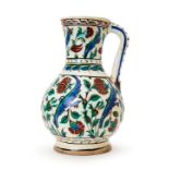 A LARGE IZNIK POTTERY JUG OTTOMAN TURKEY, 17TH CENTURY