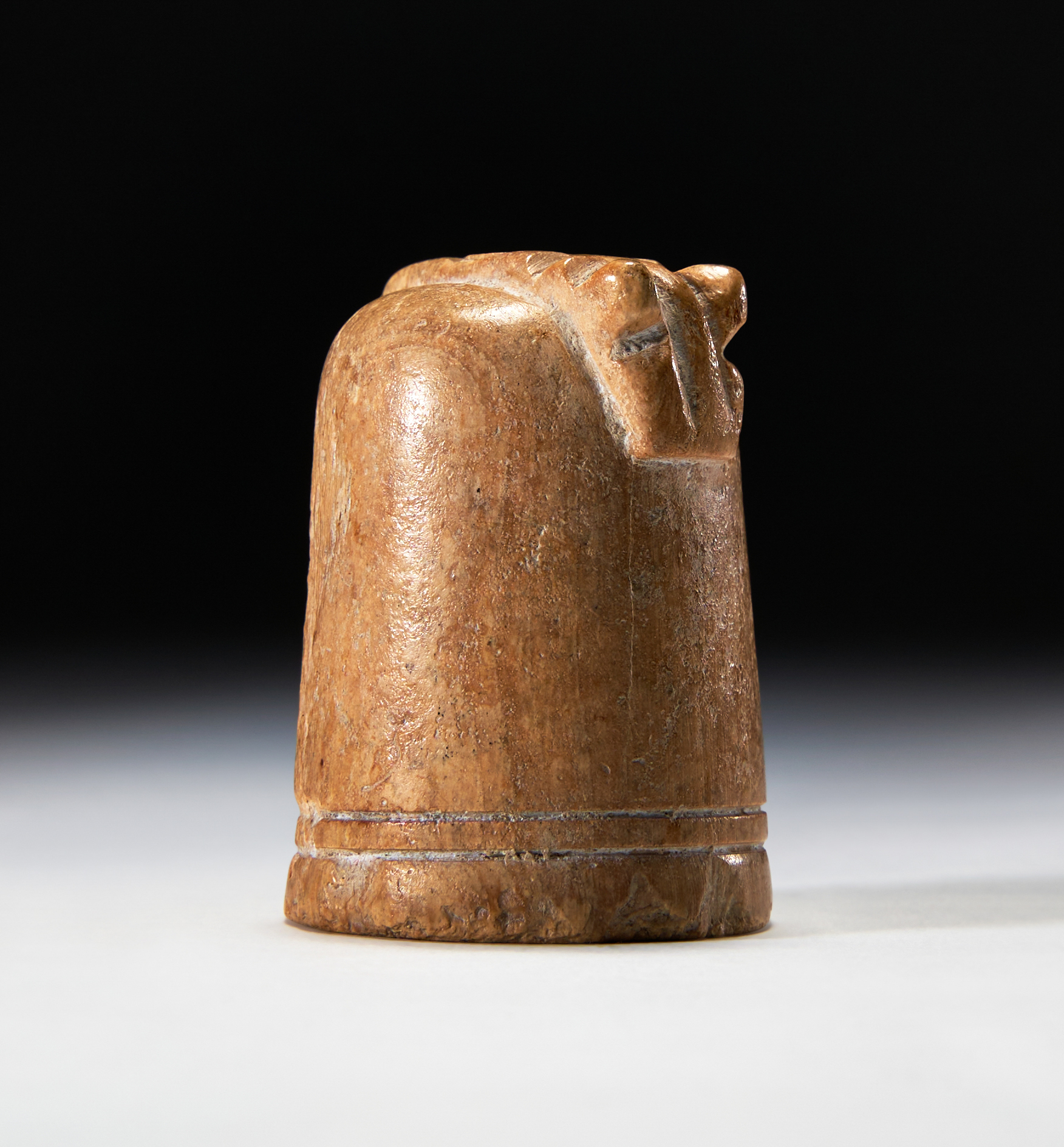 A LARGE BONE CHESS PIECE, PROBABLY A KNIGHT, 9TH-11TH CENTURY, FATIMID EGYPT