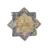 A KASHAN MOULDED LUSTRE STAR TILE IRAN, EARLY 14TH CENTURY