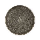 A LARGE WHITE METAL ENGRAVED FLORAL & PEACOCK DISH, INDIA, PROBABLY MUGHAL, 19TH CENTURY AND LATER